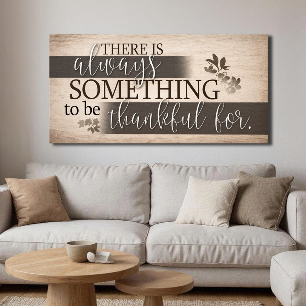 Landscape faith wall sign with beige wood grain and dark quote: “There is always something to be thankful for.”