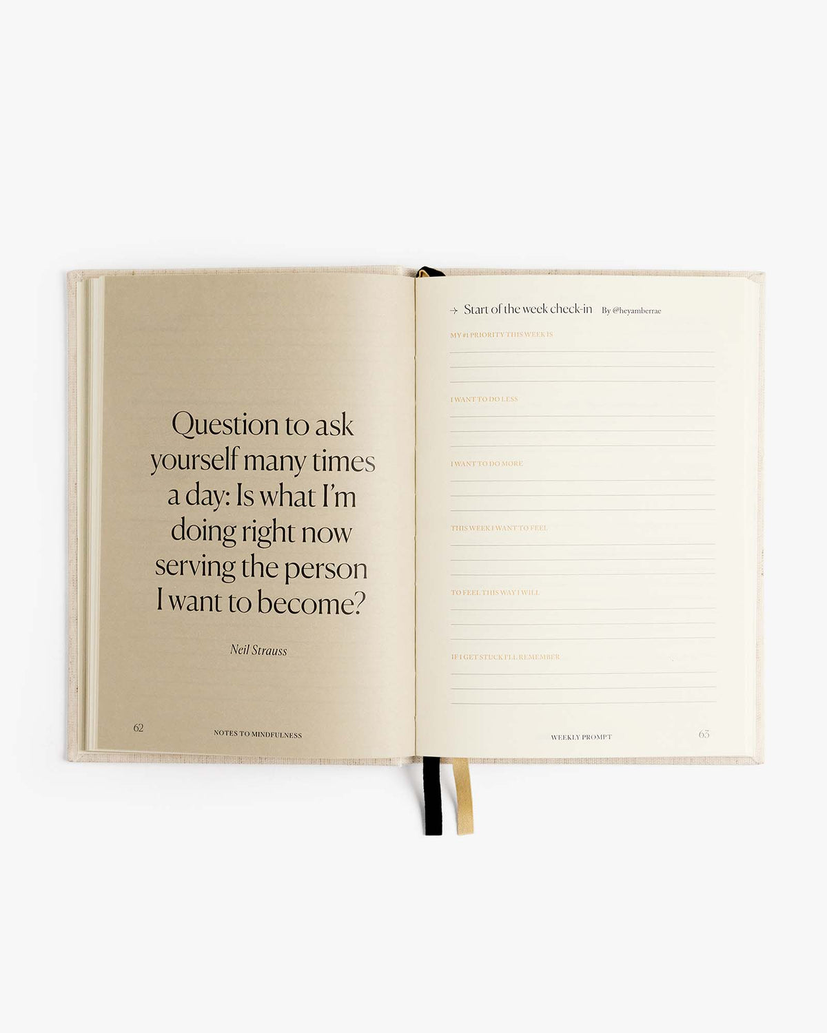 Open linen journal page with quote layout and lined notes for writing