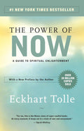 Paperback book cover: The Power of Now, spiritual enlightenment guide by Eckhart Tolle