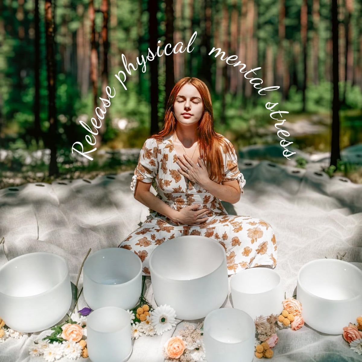 White frosted crystal singing bowls set around a person during meditation