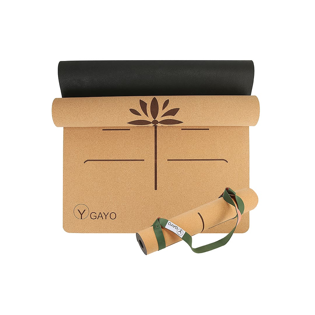 Cork yoga mat roll with natural cork color and dark carry strap