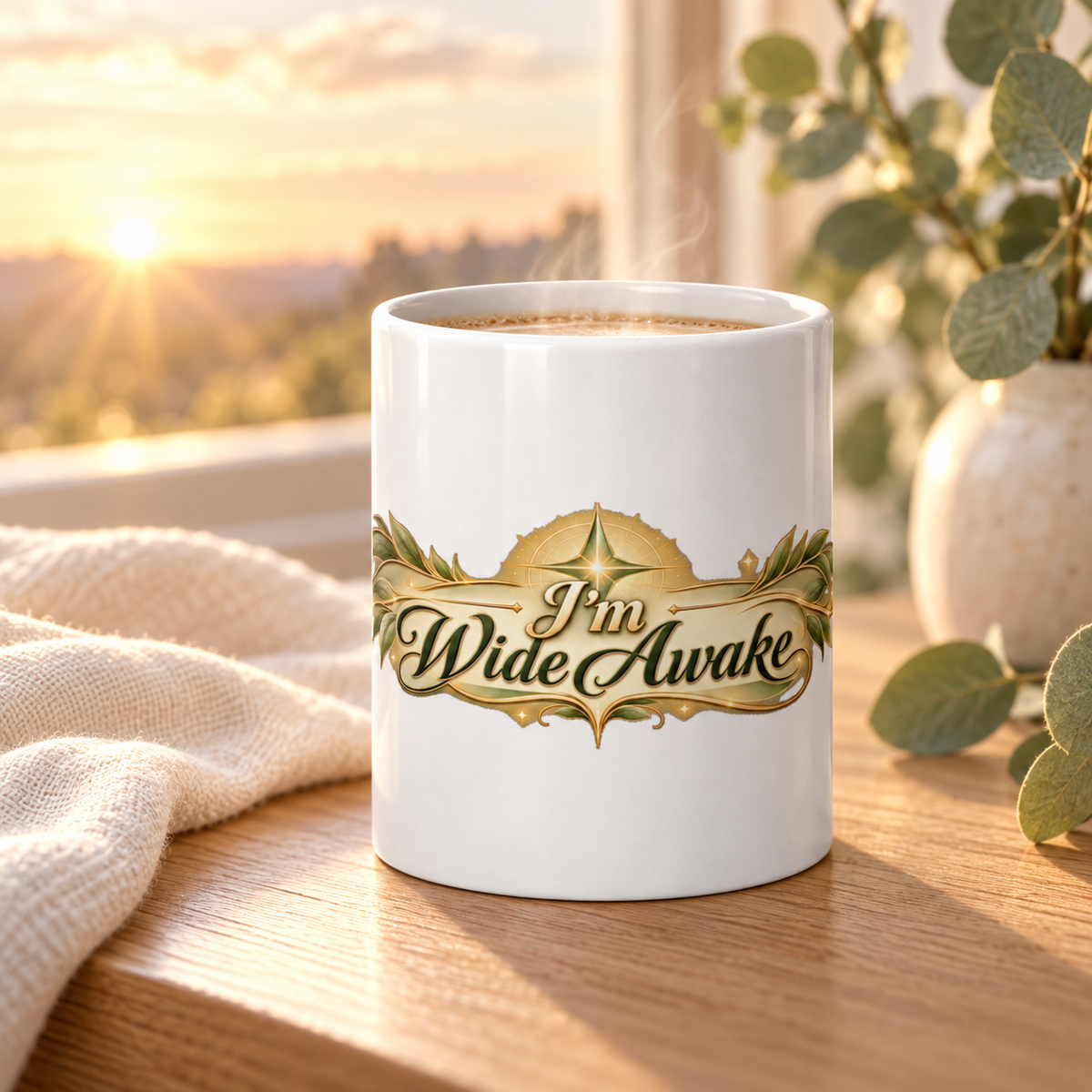 White ceramic mug with gold "I'm Wide Awake" slogan print, front view.